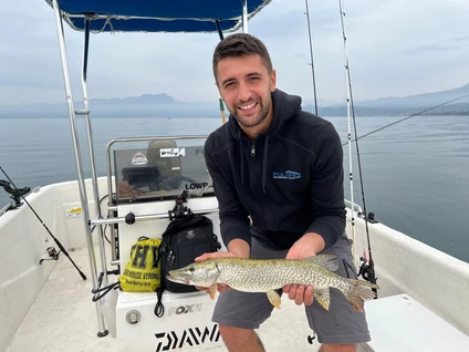 Fishing from a motorboat with a certified instructor on Lake Garda 1